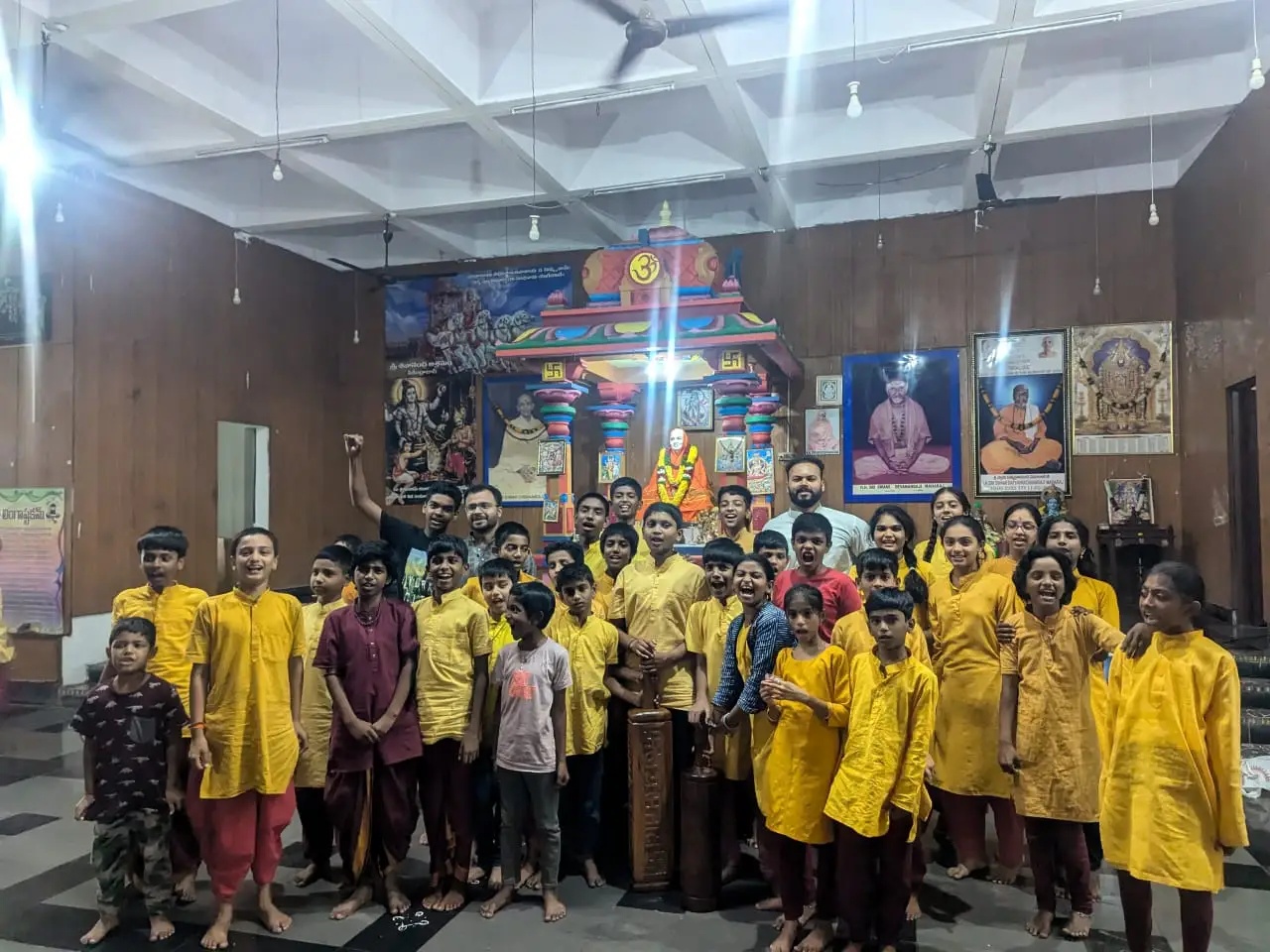 Group of students in yellow uniforms
